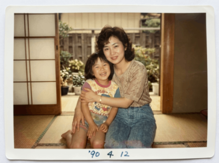 AI復元後の鮮やかな家族写真（After）